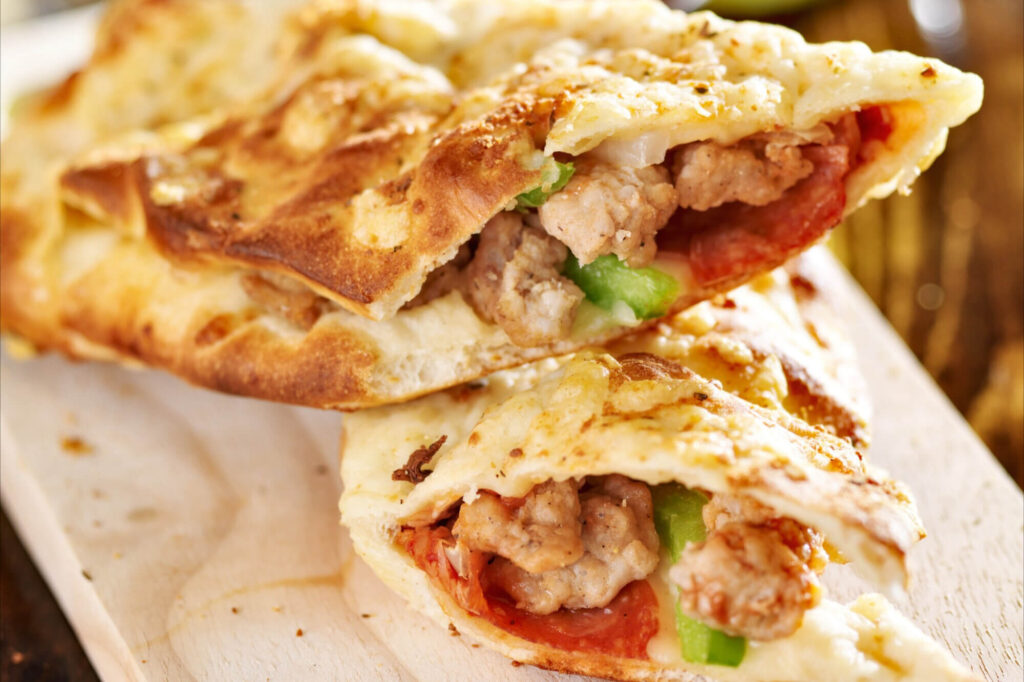Stromboli tarifi: i̇talyan usulü rulo pizza ile peynir ve şarküteri şöleni 14 Stromboli tarifi: i̇talyan usulü rulo pizza ile peynir ve şarküteri şöleni